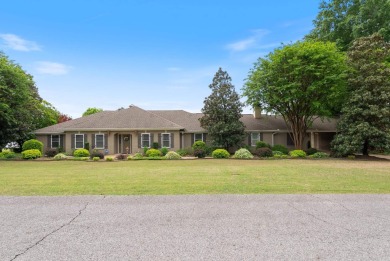 Welcome to luxury living in this stunning custom-built residence on Searcy Country Club in Arkansas - for sale on GolfHomes.com, golf home, golf lot