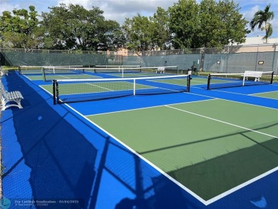 This fully renovated one-bedroom condo offers stylish comfort on Sunrise Lakes Phase III in Florida - for sale on GolfHomes.com, golf home, golf lot