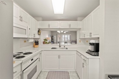 Welcome to your serene island retreat in Country Club Village 5! on Honolulu Country Club in Hawaii - for sale on GolfHomes.com, golf home, golf lot