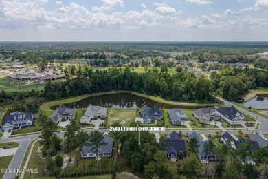 Located in the sought-after Timber Ridge section of Compass on Compass Pointe Golf Course in North Carolina - for sale on GolfHomes.com, golf home, golf lot