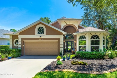 This Beautiful Home Offers Space, Architectural Features on Halifax Plantation Golf Club in Florida - for sale on GolfHomes.com, golf home, golf lot