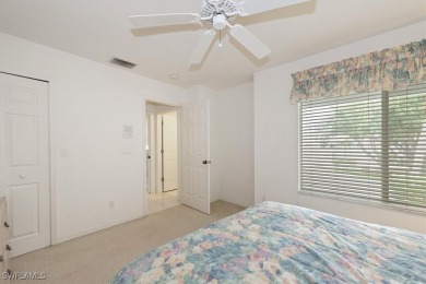 Wow!! Look at the panoramic views of the lake and 9th hole from on Estero Country Club in Florida - for sale on GolfHomes.com, golf home, golf lot