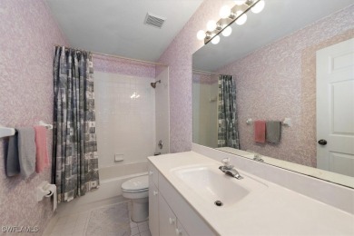 Wow!! Look at the panoramic views of the lake and 9th hole from on Estero Country Club in Florida - for sale on GolfHomes.com, golf home, golf lot
