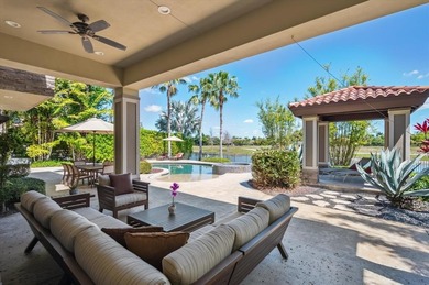Experience luxury redefined in this custom 5-bedroom, 5 full & 3 on Heron Bay Golf Club in Florida - for sale on GolfHomes.com, golf home, golf lot