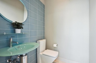 Experience luxury redefined in this custom 5-bedroom, 5 full & 3 on Heron Bay Golf Club in Florida - for sale on GolfHomes.com, golf home, golf lot