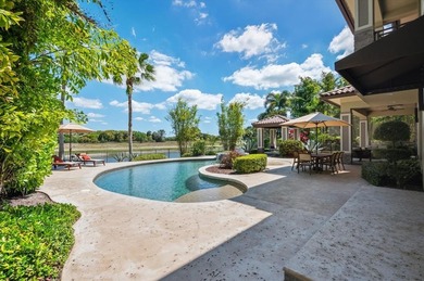 Experience luxury redefined in this custom 5-bedroom, 5 full & 3 on Heron Bay Golf Club in Florida - for sale on GolfHomes.com, golf home, golf lot