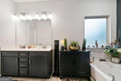 Set in a desirable golf course neighborhood, this stylish on St. Andrews Golf and Country Club in Georgia - for sale on GolfHomes.com, golf home, golf lot