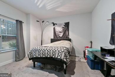 Set in a desirable golf course neighborhood, this stylish on St. Andrews Golf and Country Club in Georgia - for sale on GolfHomes.com, golf home, golf lot