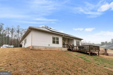 Set in a desirable golf course neighborhood, this stylish on St. Andrews Golf and Country Club in Georgia - for sale on GolfHomes.com, golf home, golf lot