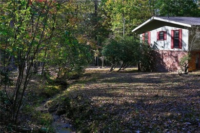 Located on the 17th green of the golf course in the resort-like on Bent Tree Golf Course in Georgia - for sale on GolfHomes.com, golf home, golf lot