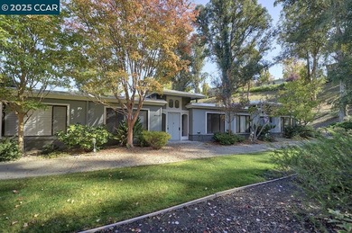 Single story, level-in nicely situated in quiet Rossmoor on Rossmoor Golf Course in California - for sale on GolfHomes.com, golf home, golf lot
