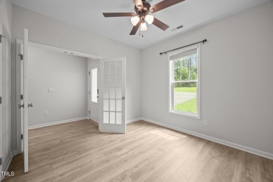 Convenient  one-floor living w/bright & open floor plan an on River Golf and Country Club at Lake Royale in North Carolina - for sale on GolfHomes.com, golf home, golf lot
