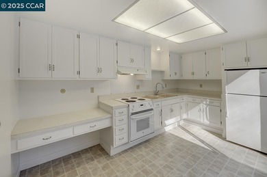 Single story, level-in nicely situated in quiet Rossmoor on Rossmoor Golf Course in California - for sale on GolfHomes.com, golf home, golf lot