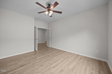 Convenient  one-floor living w/bright & open floor plan an on River Golf and Country Club at Lake Royale in North Carolina - for sale on GolfHomes.com, golf home, golf lot