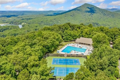 Located on the 17th green of the golf course in the resort-like on Bent Tree Golf Course in Georgia - for sale on GolfHomes.com, golf home, golf lot