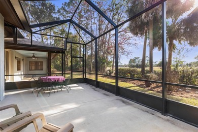 Perfectly positioned in the heart of Palm Coast, yet a world on The Grand Club - Pine Lakes Course in Florida - for sale on GolfHomes.com, golf home, golf lot