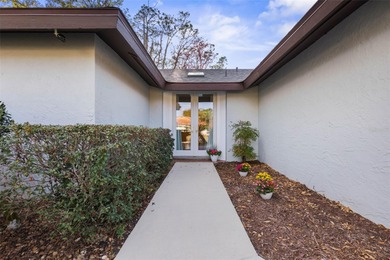 Perfectly positioned in the heart of Palm Coast, yet a world on The Grand Club - Pine Lakes Course in Florida - for sale on GolfHomes.com, golf home, golf lot