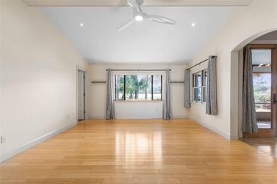 Perfectly positioned in the heart of Palm Coast, yet a world on The Grand Club - Pine Lakes Course in Florida - for sale on GolfHomes.com, golf home, golf lot