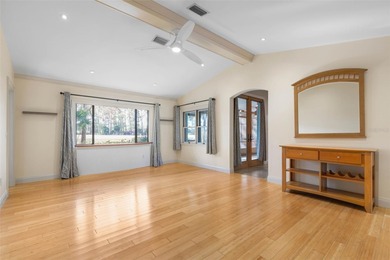 Perfectly positioned in the heart of Palm Coast, yet a world on The Grand Club - Pine Lakes Course in Florida - for sale on GolfHomes.com, golf home, golf lot