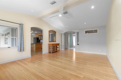 Perfectly positioned in the heart of Palm Coast, yet a world on The Grand Club - Pine Lakes Course in Florida - for sale on GolfHomes.com, golf home, golf lot