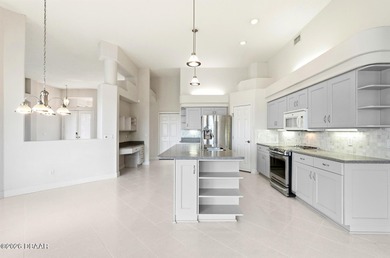 Stunning 4 bedroom, 3 bath POOL home located in the prestigious on The Club At Pelican Bay - North Course in Florida - for sale on GolfHomes.com, golf home, golf lot