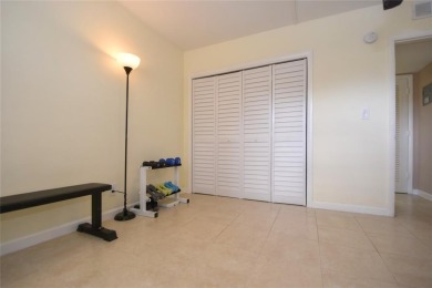Rarely available, *investor friendly*, light & bright 2 bedroom on Crystal Lake Country Club in Florida - for sale on GolfHomes.com, golf home, golf lot