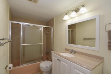 Rarely available, *investor friendly*, light & bright 2 bedroom on Crystal Lake Country Club in Florida - for sale on GolfHomes.com, golf home, golf lot