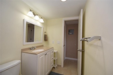 Rarely available, *investor friendly*, light & bright 2 bedroom on Crystal Lake Country Club in Florida - for sale on GolfHomes.com, golf home, golf lot