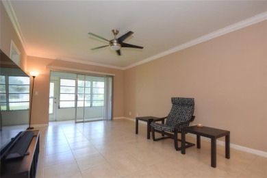 Rarely available, *investor friendly*, light & bright 2 bedroom on Crystal Lake Country Club in Florida - for sale on GolfHomes.com, golf home, golf lot