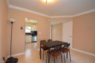 Rarely available, *investor friendly*, light & bright 2 bedroom on Crystal Lake Country Club in Florida - for sale on GolfHomes.com, golf home, golf lot