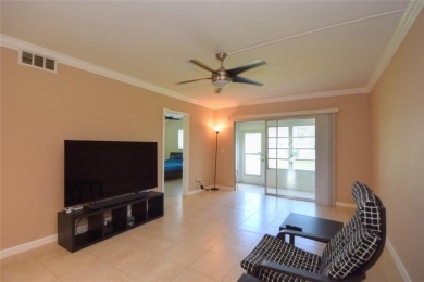 Rarely available, *investor friendly*, light & bright 2 bedroom on Crystal Lake Country Club in Florida - for sale on GolfHomes.com, golf home, golf lot