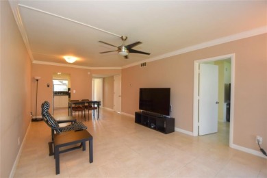 Rarely available, *investor friendly*, light & bright 2 bedroom on Crystal Lake Country Club in Florida - for sale on GolfHomes.com, golf home, golf lot