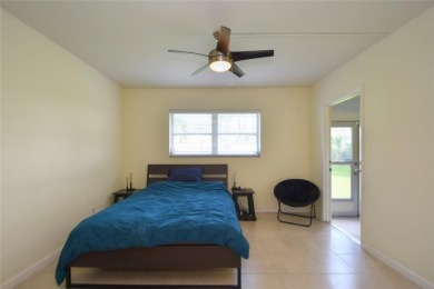 Rarely available, *investor friendly*, light & bright 2 bedroom on Crystal Lake Country Club in Florida - for sale on GolfHomes.com, golf home, golf lot