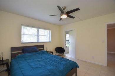 Rarely available, *investor friendly*, light & bright 2 bedroom on Crystal Lake Country Club in Florida - for sale on GolfHomes.com, golf home, golf lot