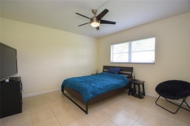 Rarely available, *investor friendly*, light & bright 2 bedroom on Crystal Lake Country Club in Florida - for sale on GolfHomes.com, golf home, golf lot