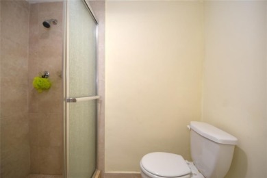 Rarely available, *investor friendly*, light & bright 2 bedroom on Crystal Lake Country Club in Florida - for sale on GolfHomes.com, golf home, golf lot