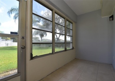 Rarely available, *investor friendly*, light & bright 2 bedroom on Crystal Lake Country Club in Florida - for sale on GolfHomes.com, golf home, golf lot