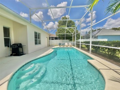 Welcome to this marvelous 4-bedroom, 3-bathroom home! Featuring on Ridgewood Lakes Golf and Country Club in Florida - for sale on GolfHomes.com, golf home, golf lot