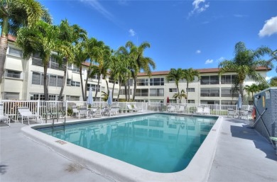 Rarely available, *investor friendly*, light & bright 2 bedroom on Crystal Lake Country Club in Florida - for sale on GolfHomes.com, golf home, golf lot