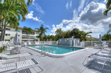 Rarely available, *investor friendly*, light & bright 2 bedroom on Crystal Lake Country Club in Florida - for sale on GolfHomes.com, golf home, golf lot