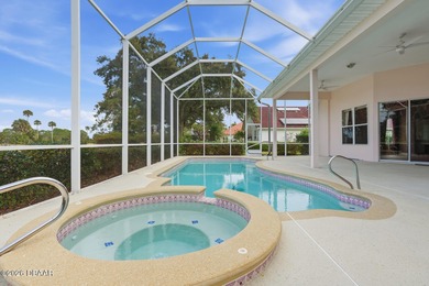 Stunning 4 bedroom, 3 bath POOL home located in the prestigious on The Club At Pelican Bay - North Course in Florida - for sale on GolfHomes.com, golf home, golf lot