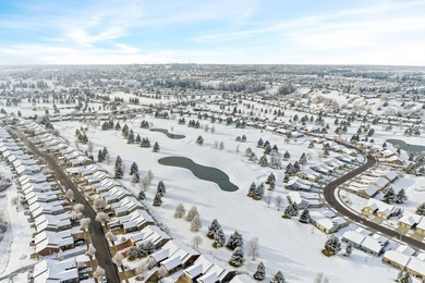 Beautifully maintained home in the desirable Village Greens on Village Greens Golf Club in Montana - for sale on GolfHomes.com, golf home, golf lot