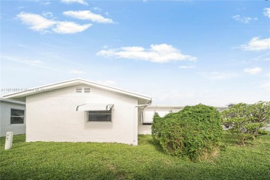 Stunning 3 bedroom 2 bathroom all new modern renovation with on Leisureville Community Golf Course in Florida - for sale on GolfHomes.com, golf home, golf lot