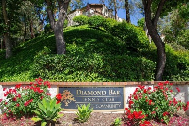 Welcome to your move-in ready upstairs condo, perfectly situated on Diamond Bar Golf Course in California - for sale on GolfHomes.com, golf home, golf lot