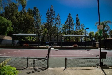 Welcome to your move-in ready upstairs condo, perfectly situated on Diamond Bar Golf Course in California - for sale on GolfHomes.com, golf home, golf lot