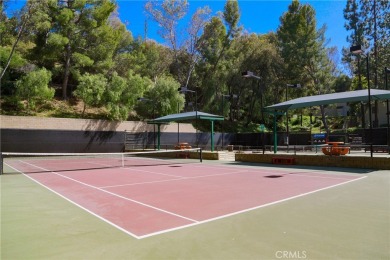 Welcome to your move-in ready upstairs condo, perfectly situated on Diamond Bar Golf Course in California - for sale on GolfHomes.com, golf home, golf lot