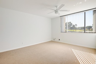 This stunning 2-bedroom, 2-bathroom condo is located on the on Fountains Golf and Country Club in Florida - for sale on GolfHomes.com, golf home, golf lot