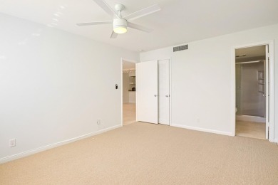 This stunning 2-bedroom, 2-bathroom condo is located on the on Fountains Golf and Country Club in Florida - for sale on GolfHomes.com, golf home, golf lot