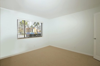 This stunning 2-bedroom, 2-bathroom condo is located on the on Fountains Golf and Country Club in Florida - for sale on GolfHomes.com, golf home, golf lot