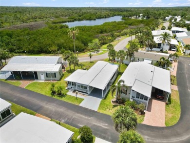Step into the epitome of coastal charm and comfort with this on Twin Isles Country Club in Florida - for sale on GolfHomes.com, golf home, golf lot